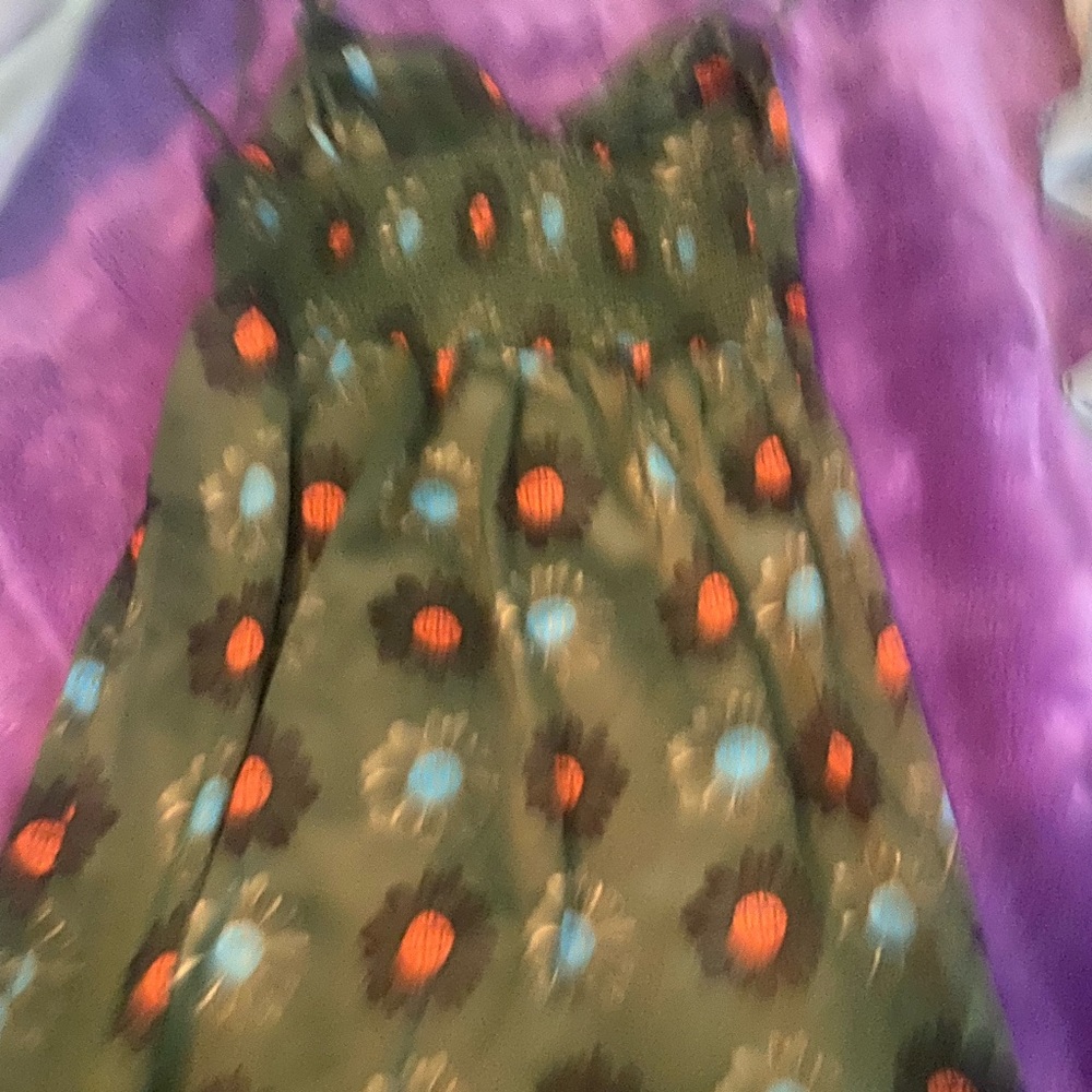 A Green dress with colorful sunflowers